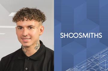 Young person with brown hair wearing a black shirt portrayed next to the word shoosmiths on blue background