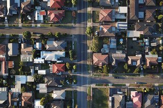 Aerial view of houses and streets.