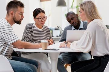 A group of colleagues working on a project