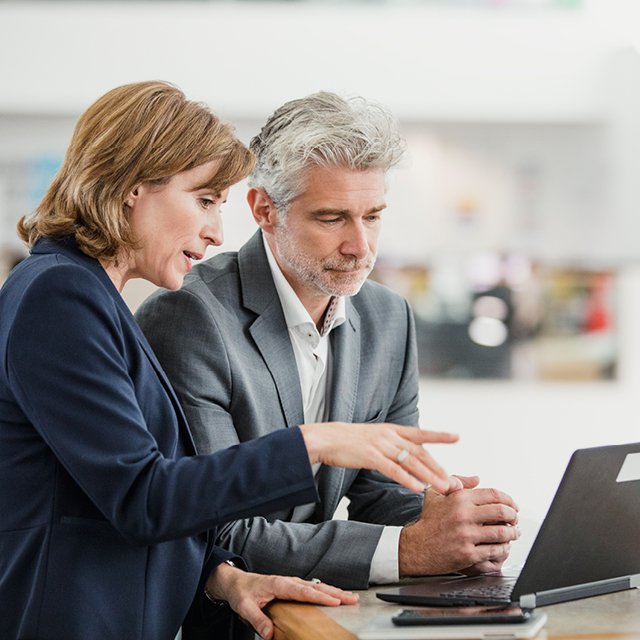 Two colleagues speaking