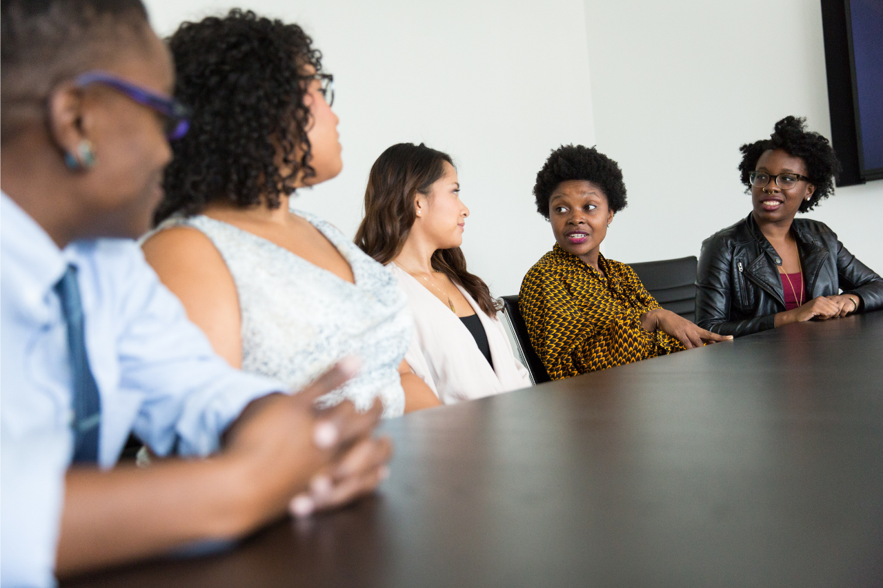 Group of people having a conversation.