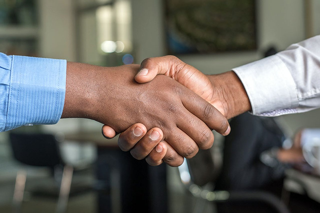 Two people shaking hands