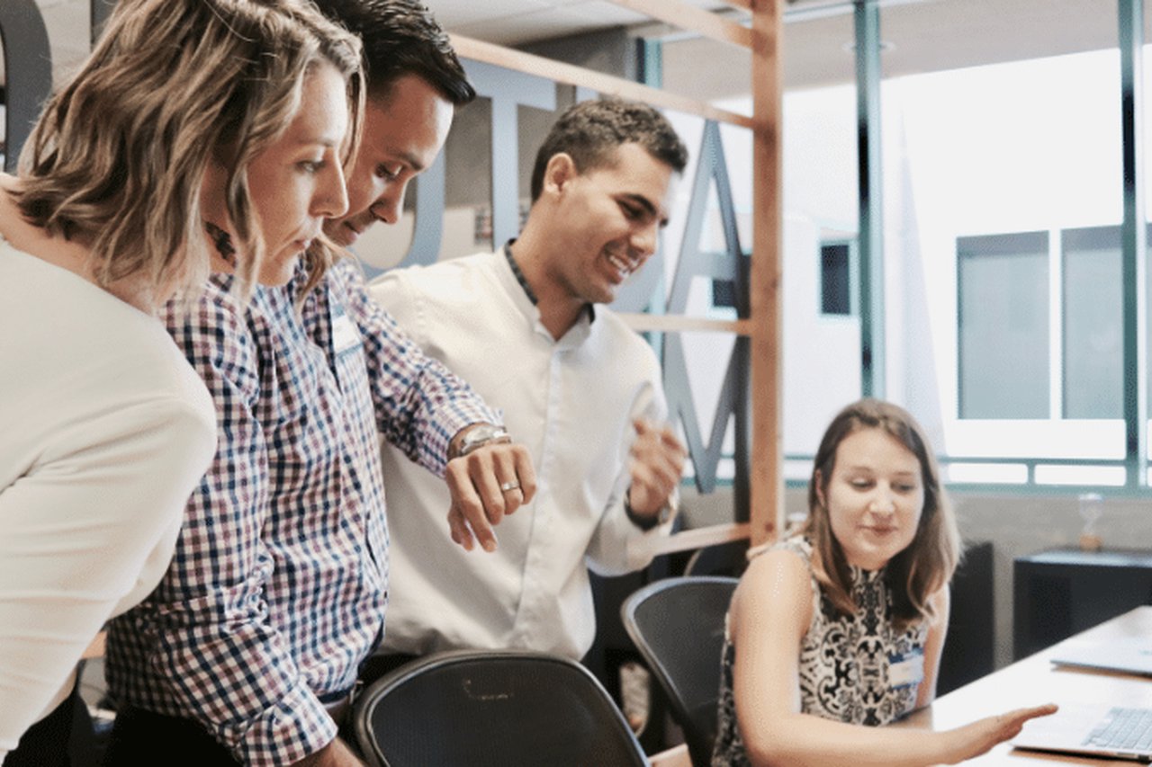 Group of employees discussing