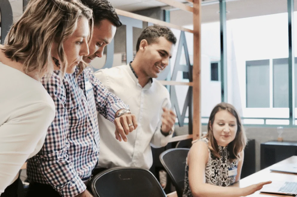 Group of employees discussing