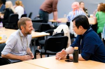 Two colleagues having a conversation