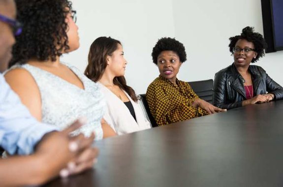 Group of people having a conversation.