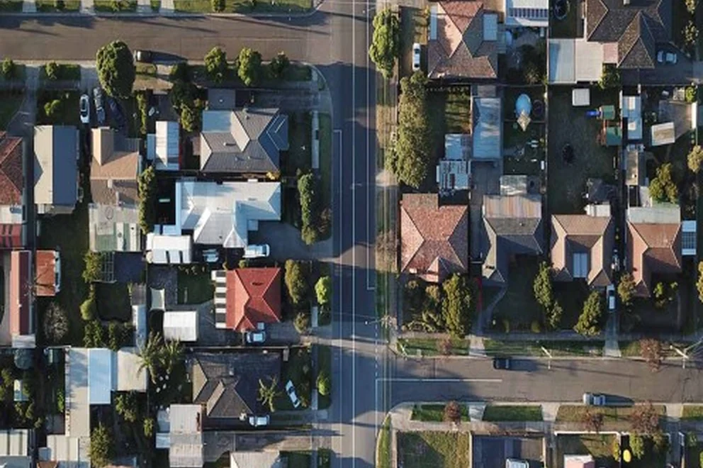 Aerial view of houses and streets.