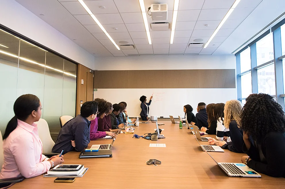 A group of women in a boardroom
