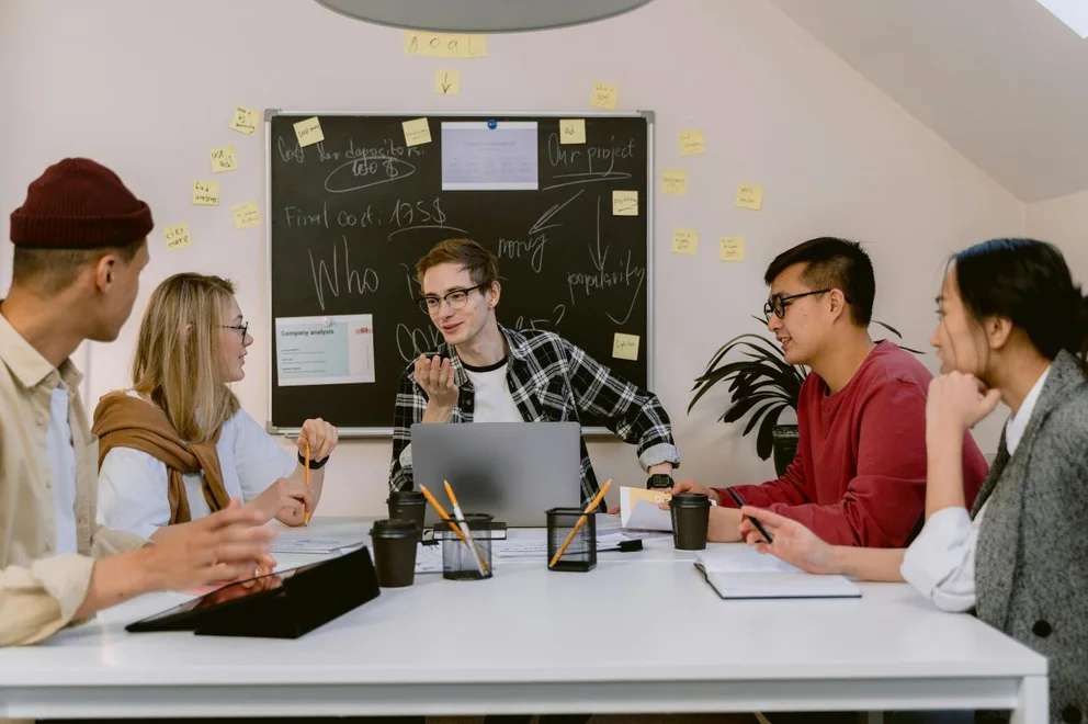 A group of colleagues having a meeting