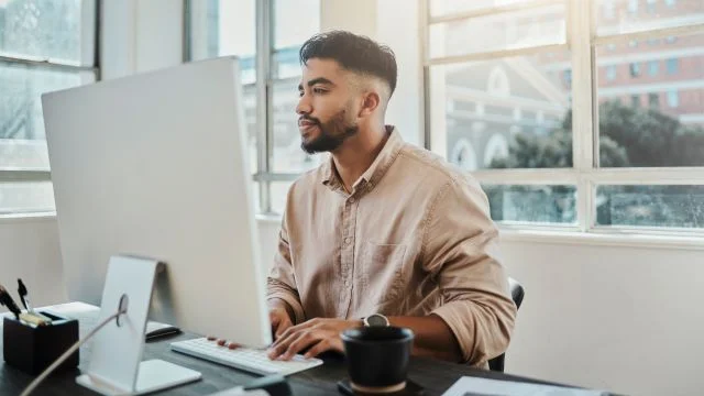A man working on a desktop