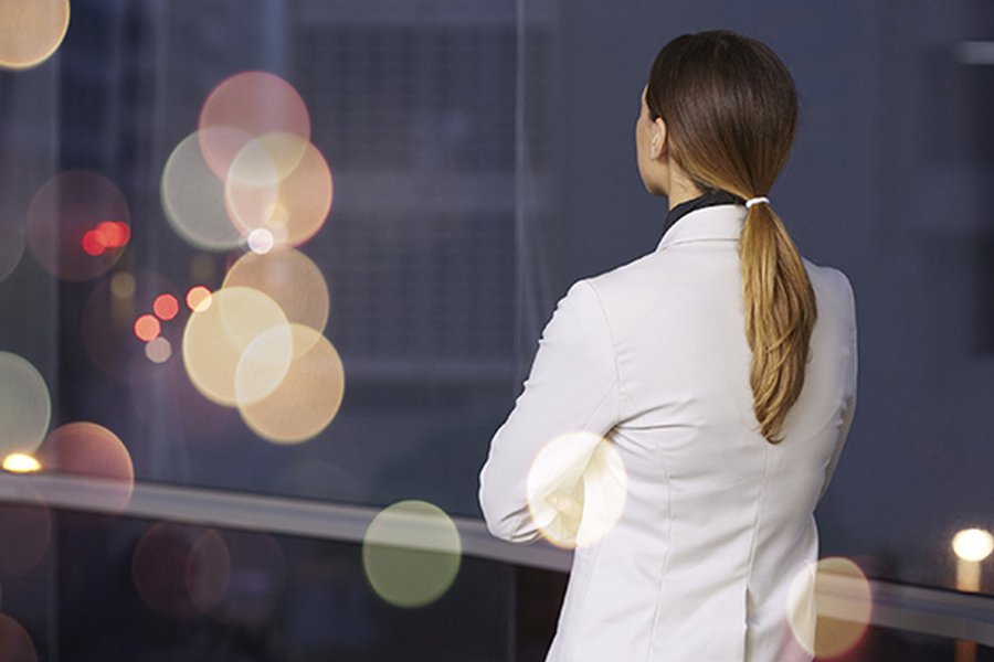 Woman looking out a window