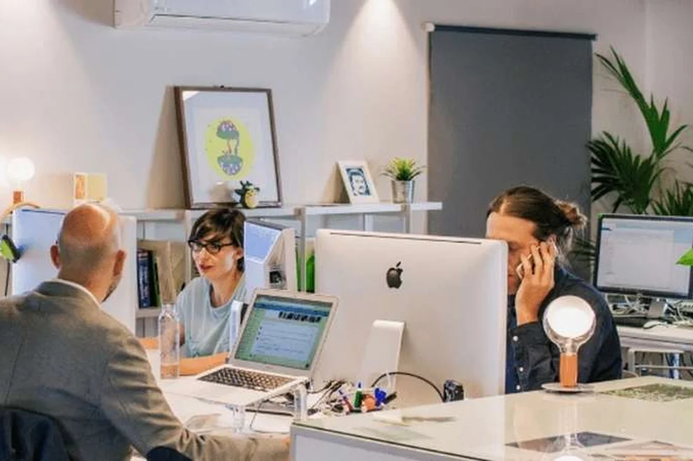 People sat in an office talking