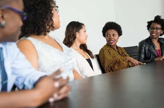 Group of people having a conversation.